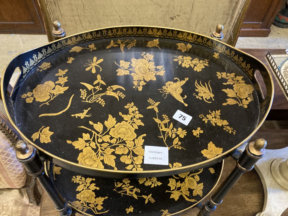 A black and gold japanned two tier toleware tray table, width 48cm, depth 36cm, height 57cm